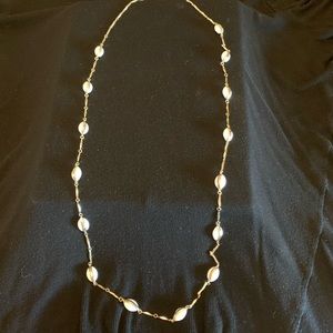 Long white and gold necklace